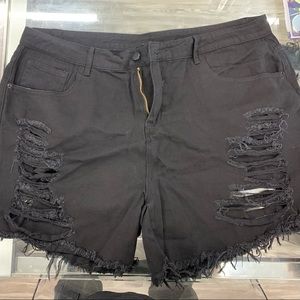 black ripped shorts